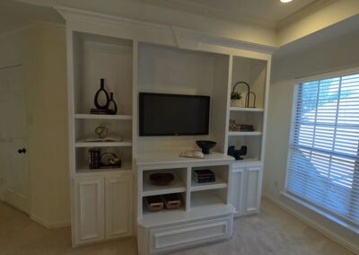 cabinet painting built in entertainment center white finish shelving crown molding