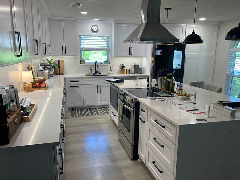 cabinet painting gray kitchen full layout island range hood white quartz countertop