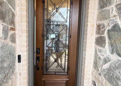 door painting front entry door iron glass insert stone surround full view painted frame