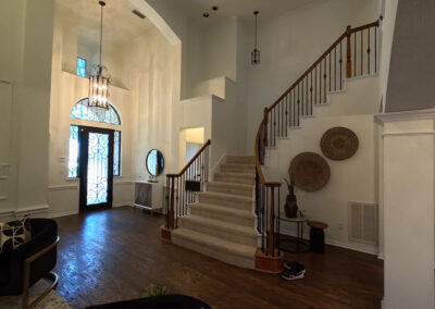 interior painting grand foyer two story arched entry smooth wall finish chandelier