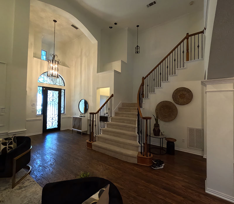 interior painting grand foyer two story arched entry smooth wall finish chandelier