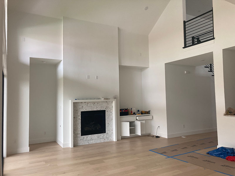 interior painting new construction great room high ceilings fireplace freshly painted walls